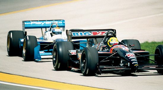 Pair of Indy cars illustrating the drafting concept
