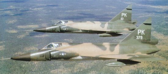 Camouflaged F-102 interceptors on patrol over South Vietnam